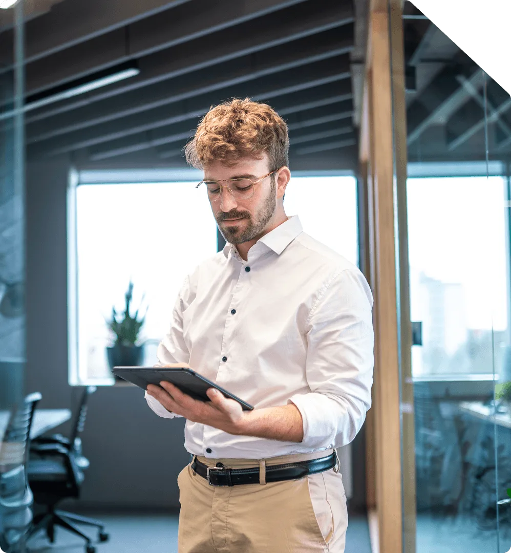 A care coordinator checking follow-up schedules on a tablet